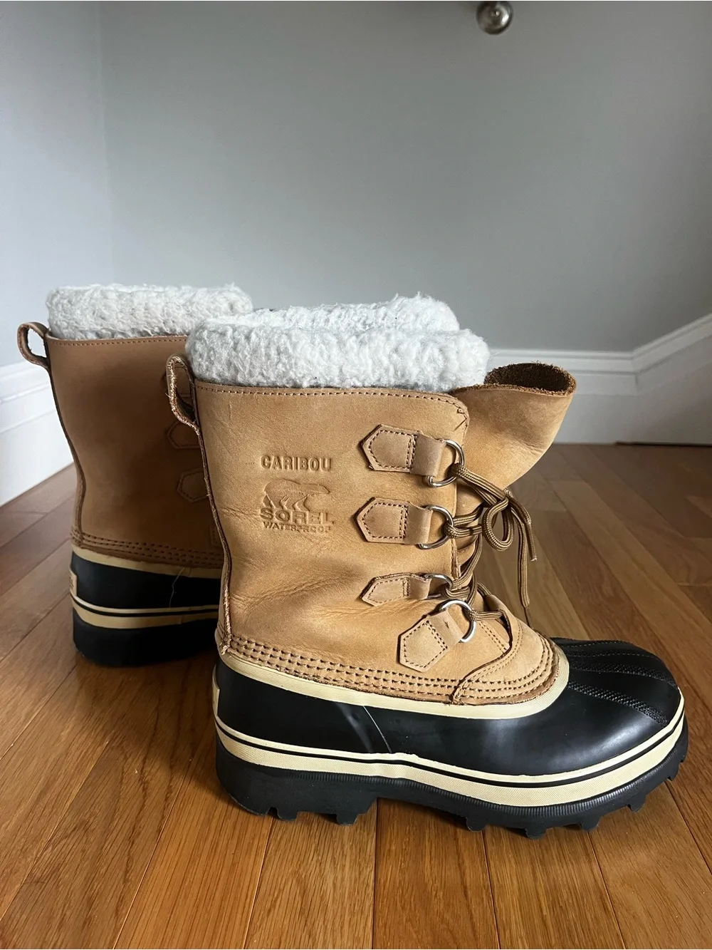 Sorel Tan and Black Caribou Winter Boots